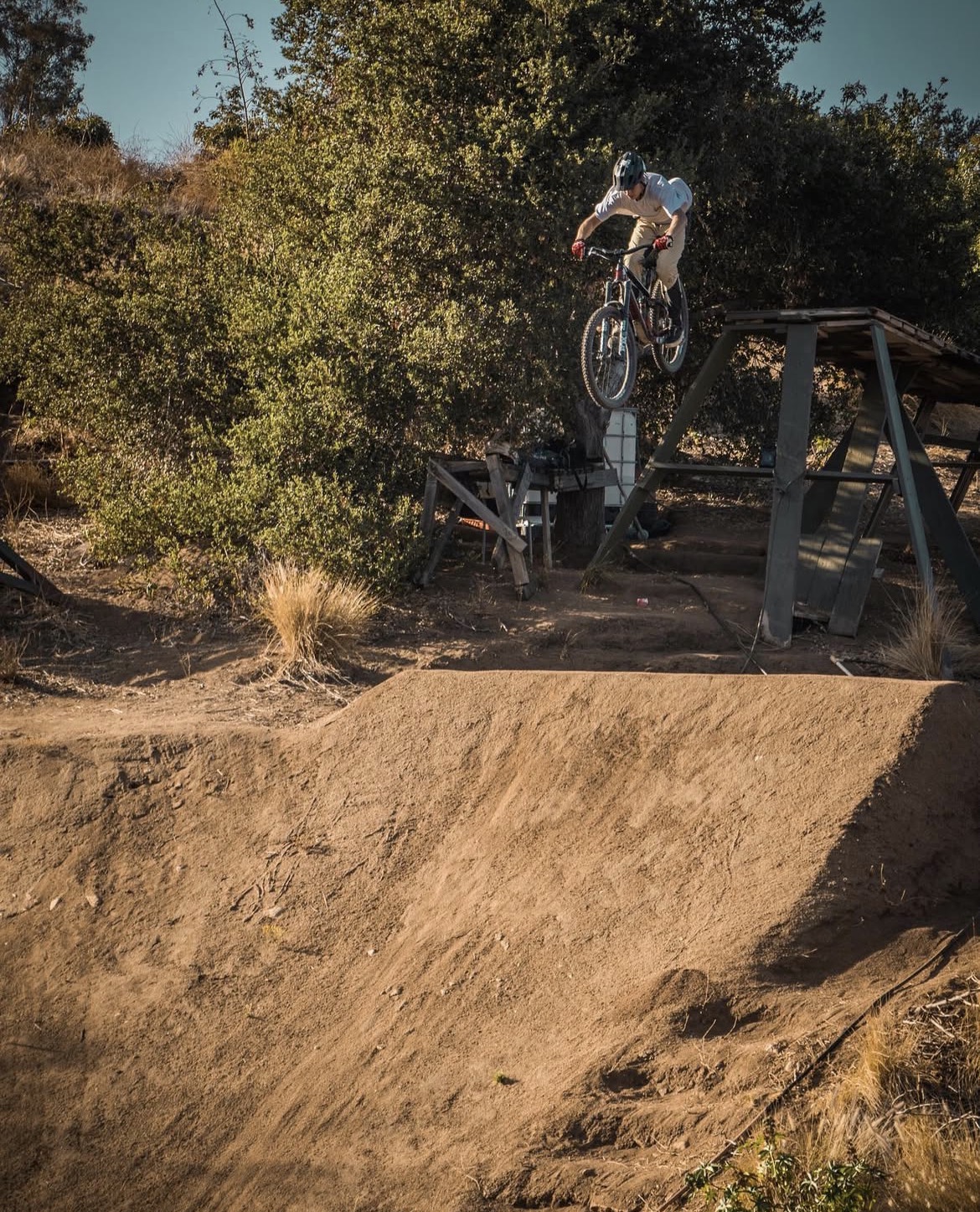 Rider mid-air on a dirt jump — Good Ol' Boys